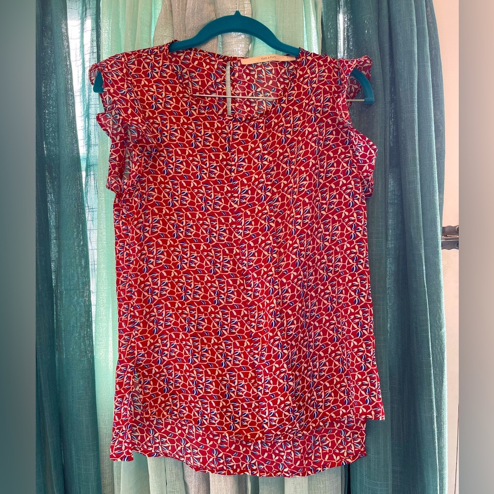 Red flutter sleeve blouse